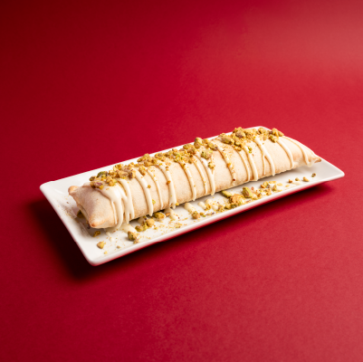 Rolling Milkybar Pistacho Increíble!!! Enrollado de masa de pizza relleno con milkybar de pistacho, combinalo con tus toppings favoritos.
